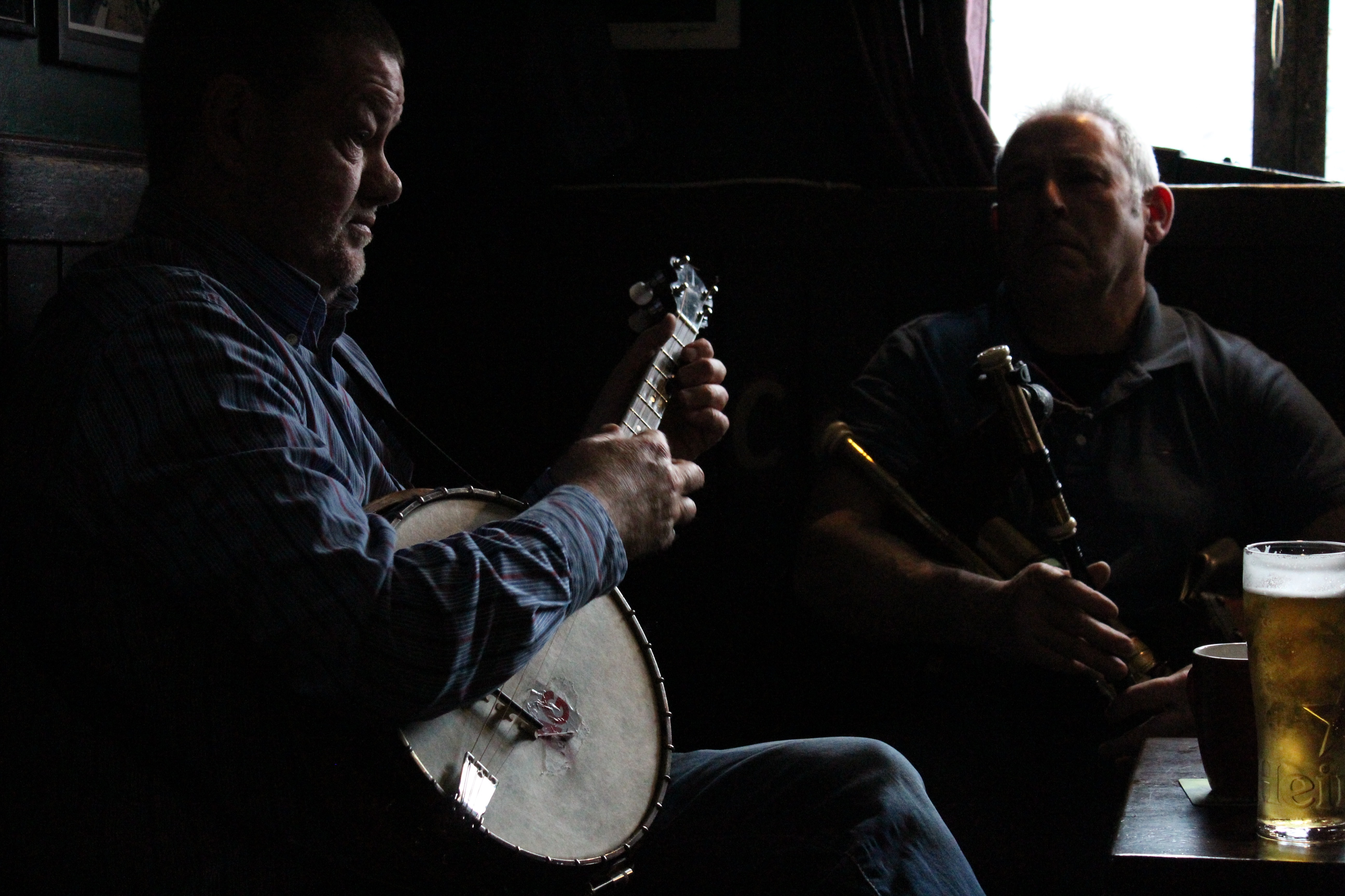 Image of older men in a pub